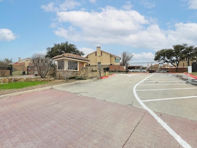 View of secondary gated entrance into the complex