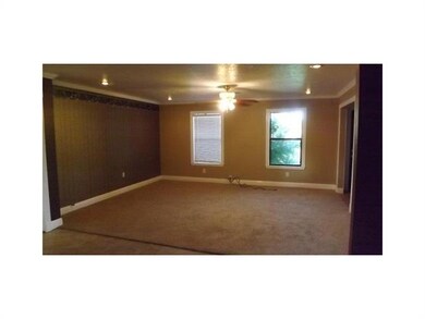 Living Room. LIVING ROOM W/ NEW CARPET.
