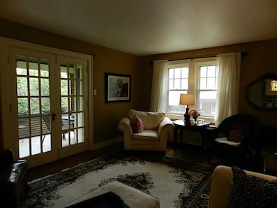 Living Room. French doors access the covered side 