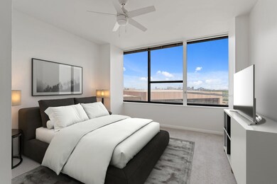 Second bedroom shown virtually staged.