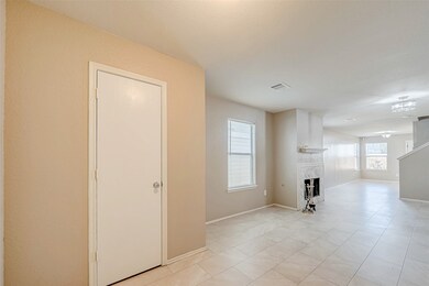 Spacious room with ample natural light, ideal for a cozy yet modern living space.