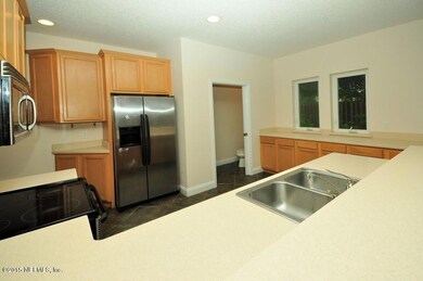 Large kitchen with breakfast bar