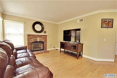 The family room which opens to the kitchen and the