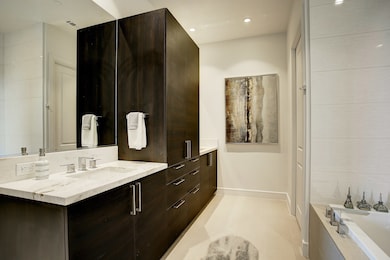 The master bathroom has double sinks and lot of Ca
