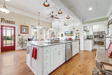 Kitchen featuring appliances with stainless steel