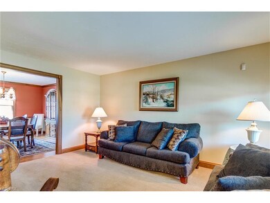Large bright living room beautifully trimmed out w