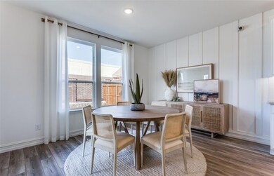 Dining nook off kitchen *Photos of furnished model
