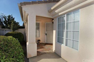 Entry porch is tiled and there is a security scree