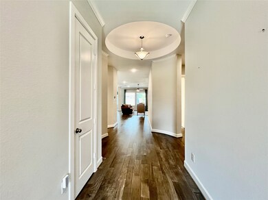 Spectacular foyer with rotunda ceiling greets you as you walk into the home