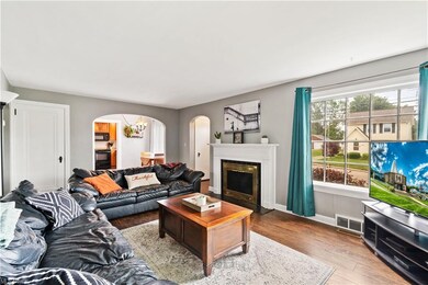 Charming arched doorways and large picture window 