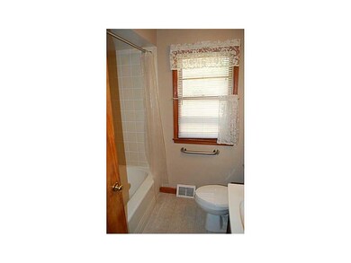 Bathroom. Hall bathroom with fully tiled walls