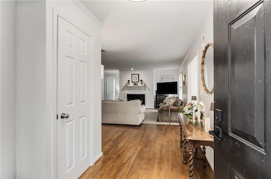Step inside this updated home to discover rich har
