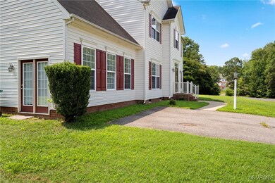 View of home's exterior featuring a yard