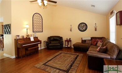 Beautiful cathedral ceilings in the living room.