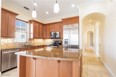 Kitchen with a sink, appliances with stainless ste