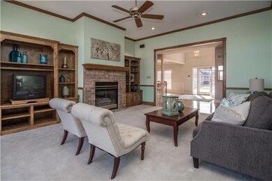 The main floor family room features beautiful buil