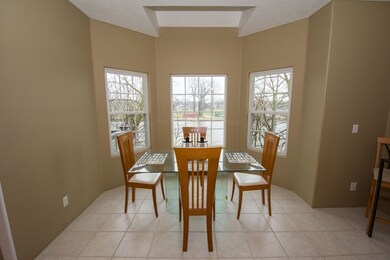 Large bay windows bring in great views of the rive