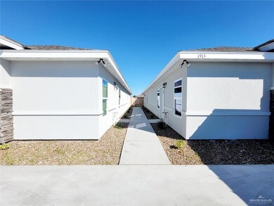 View of property exterior with stucco siding