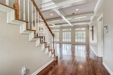 View from entry with gorgeous windows overlooking pool and backyard.