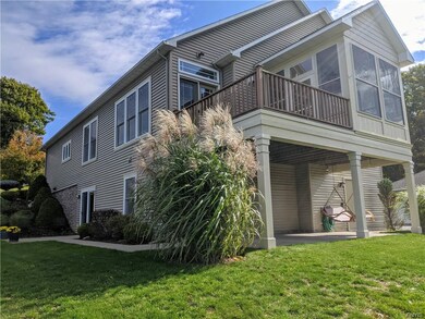 Elevated sunroom, deck and walkout access from low