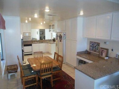 Large breakfast nook area with greenhouse window, 