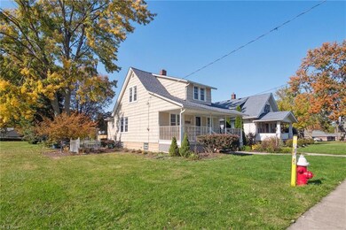 View of front of property with a front yard and a 