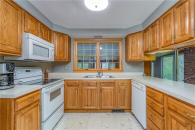 Country Kitchen with Hickory Cabinetry
