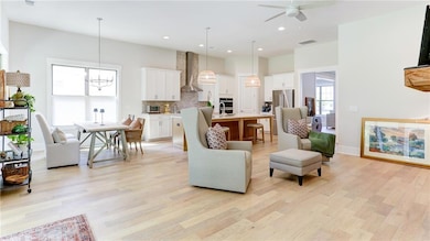 View of Family Room wide open to Kitchen in background