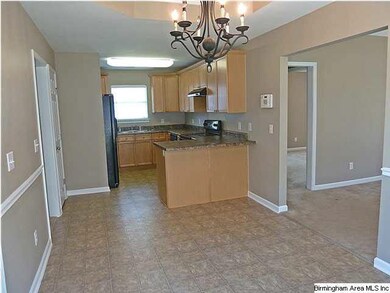 Another view of the kitchen