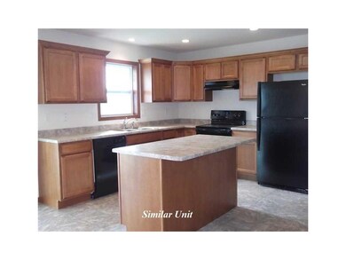 Kitchen. Picture is of Similar Unit.