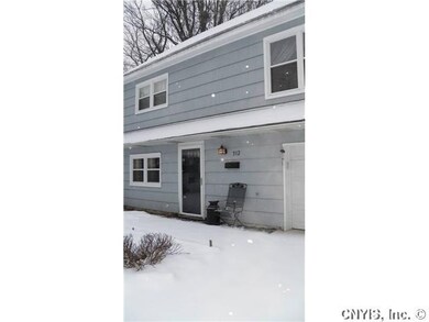 Exterior Front. New front door, garage door and op