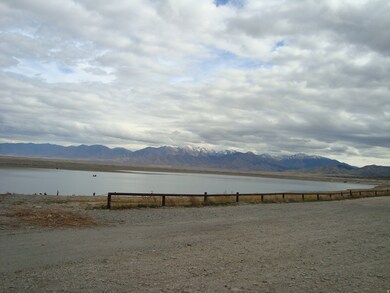 Mountain view featuring a large body of water