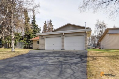 2 Car Garage & Plenty of Paved Parking