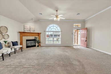 Enter into living area with gas fireplace