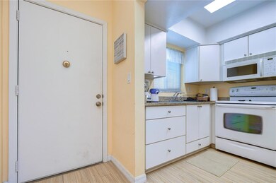 6767 Sunset Way unit 203, Saint Pete Beach, FL 33706 - photo 4