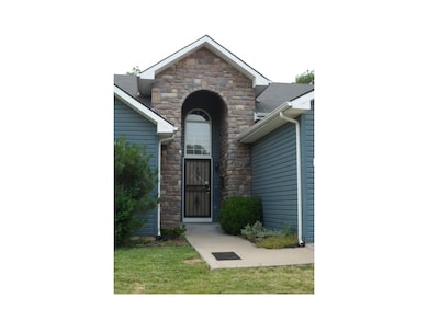 Beautiful stone trim with vinyl siding.