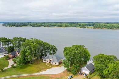 WOW! What a view! Wake up to this view every morning and enjoy your life on the best fishing lake in North Carolina.