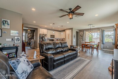 Living space open to kitchen and dining