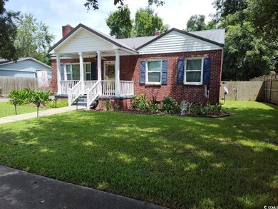 View of front facade featuring a porch and a front