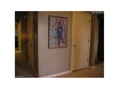 Convenient Foyer Leads to Several Rooms
