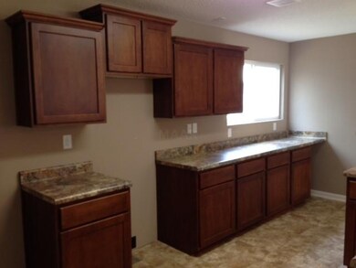 Cabinets on the back wall