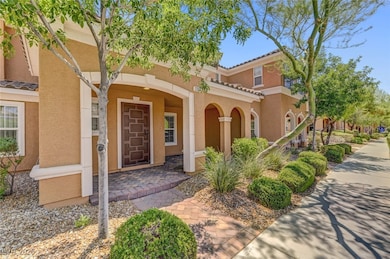 View of front of house featuring stucco siding and