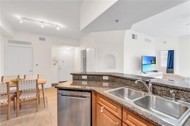 Kitchen with dishwasher, ornamental molding, rail 