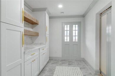 BEAUTIFUL BUTLERS PANTRY OFF OF KITCHEN