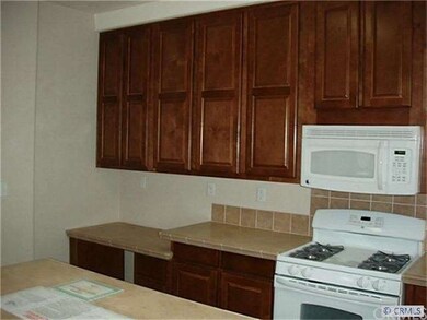 kitchen counter drops down to provide a built-in w