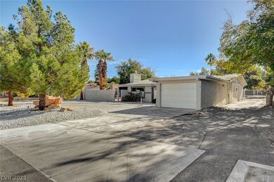 FRONT HOUSE.  DRIVEWAY TO RIGHT OF HOME LEADS TO T