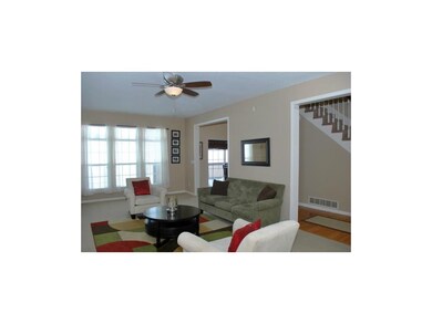 Natural light fills the living room from the windo