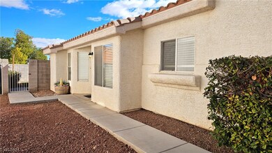 Lovely, clear sidewalk leads up to the front door.