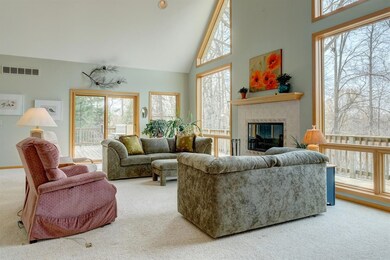 GREAT ROOM FIREPLACE AND WINDOW DOOR