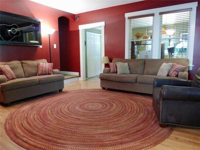 Living Room. Imagine relaxing with family or friends in this delightful living room!  The new laminate flooring is not only handsome but stands up to any punishment pets or toys could give it!